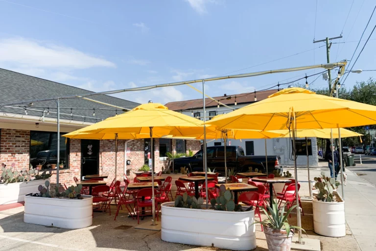 Pink Cactus underrated outdoor seating with umbrella shades